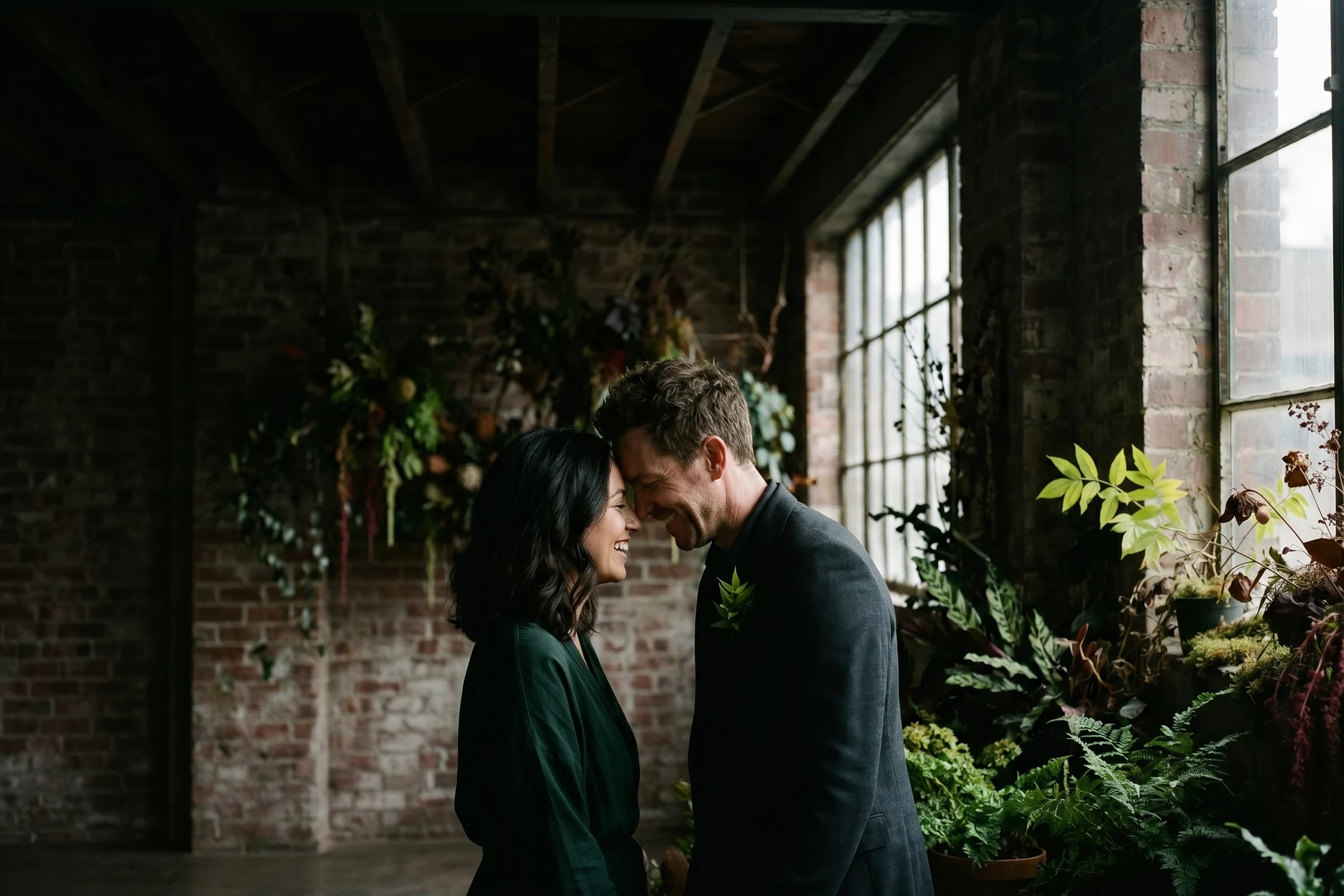 Mia and Jack together, foreheads touching, inside The Foundry