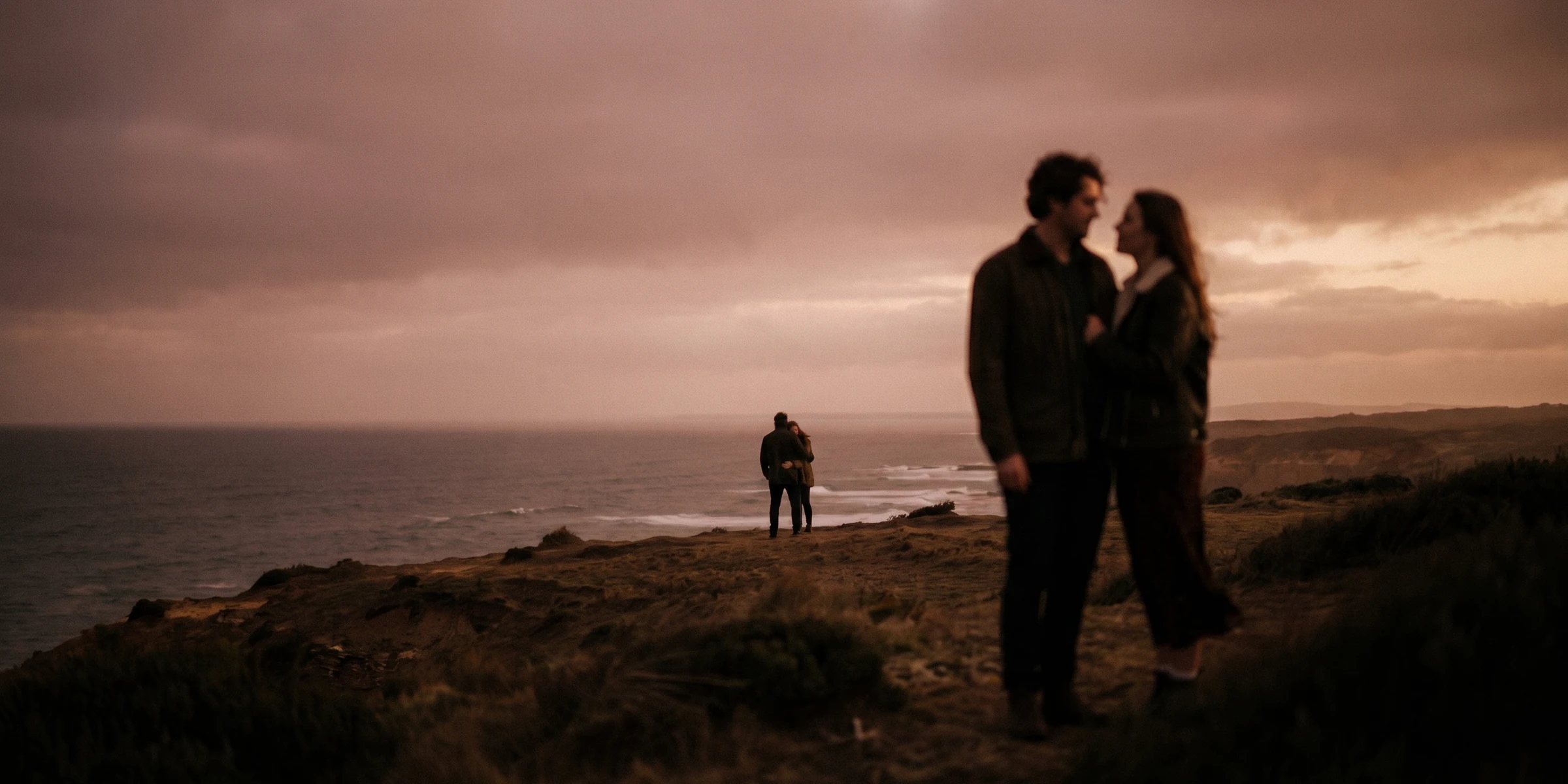 Couple close together at golden hour