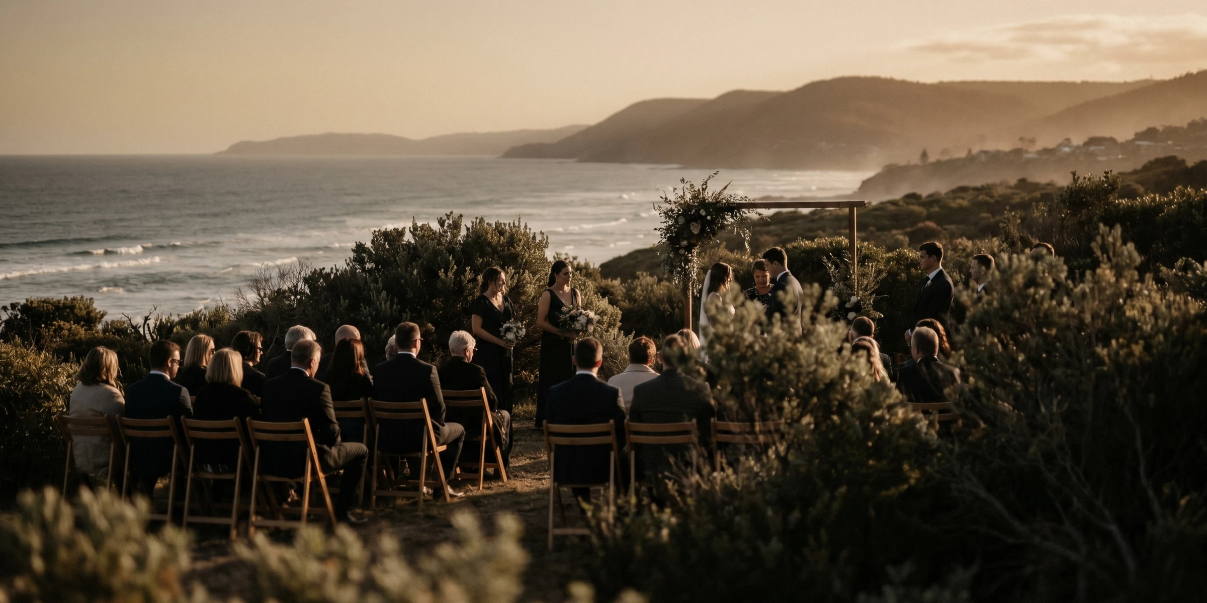 Clifftop wedding ceremony at golden hour, Lorne
